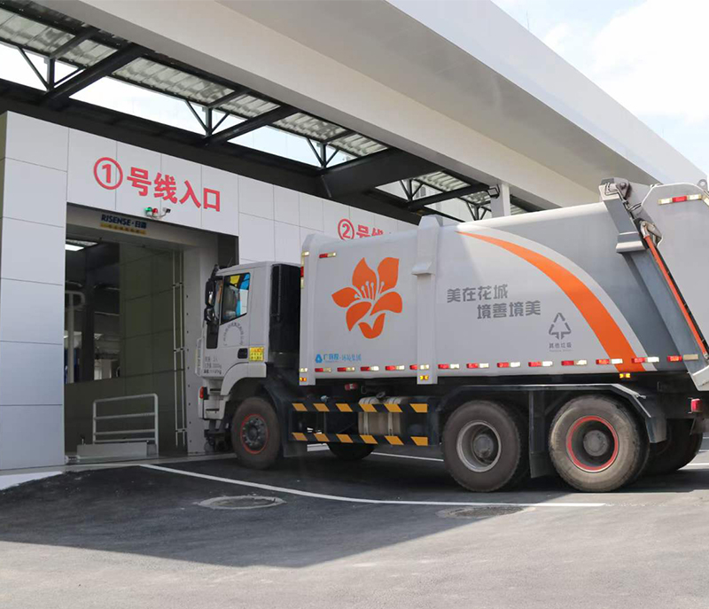 Garbage truck disinfecting and washing machine